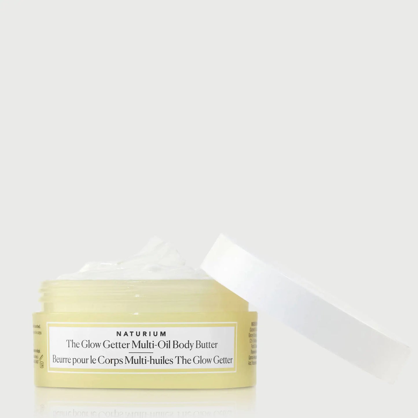the-glow-getter-multi-oil-body-butter-travel-size-y0 NATR-40115_Glow-Getter-Body-Butter-Mini_front_capoff_bonebkgd.webp