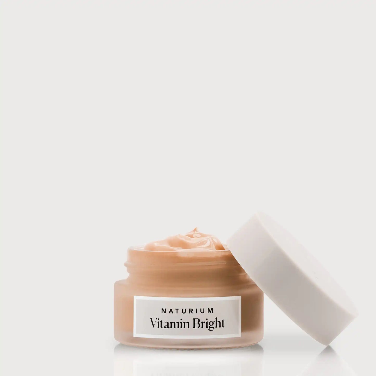 vitamin-bright-illuminating-eye-cream-c6 NATR-VitaminBright_DEEP_Primary_front_openjar_bone.webp