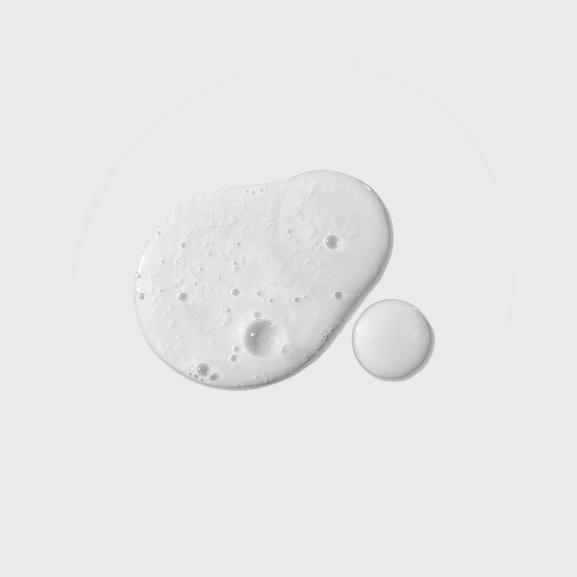 the-purifier-niacinamide-serum-body-wash-c5 NATR-40012-Swatch-The-Purifier-Niacinamide-Serum-Body-Wash-bonebkgd.jpg
