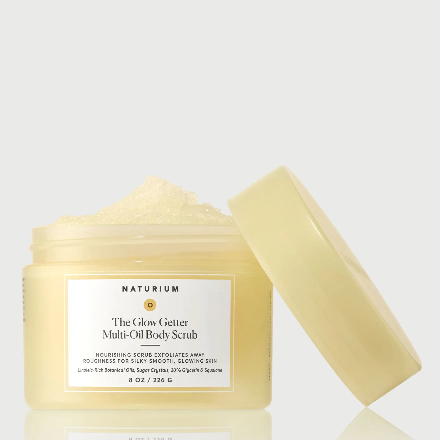 the-glow-getter-multi-oil-body-scrub-i5 NATR-40028-GlowGetter-Multi-Oil-Body-Scrub-Front-CapOff-bonebkgd.webp