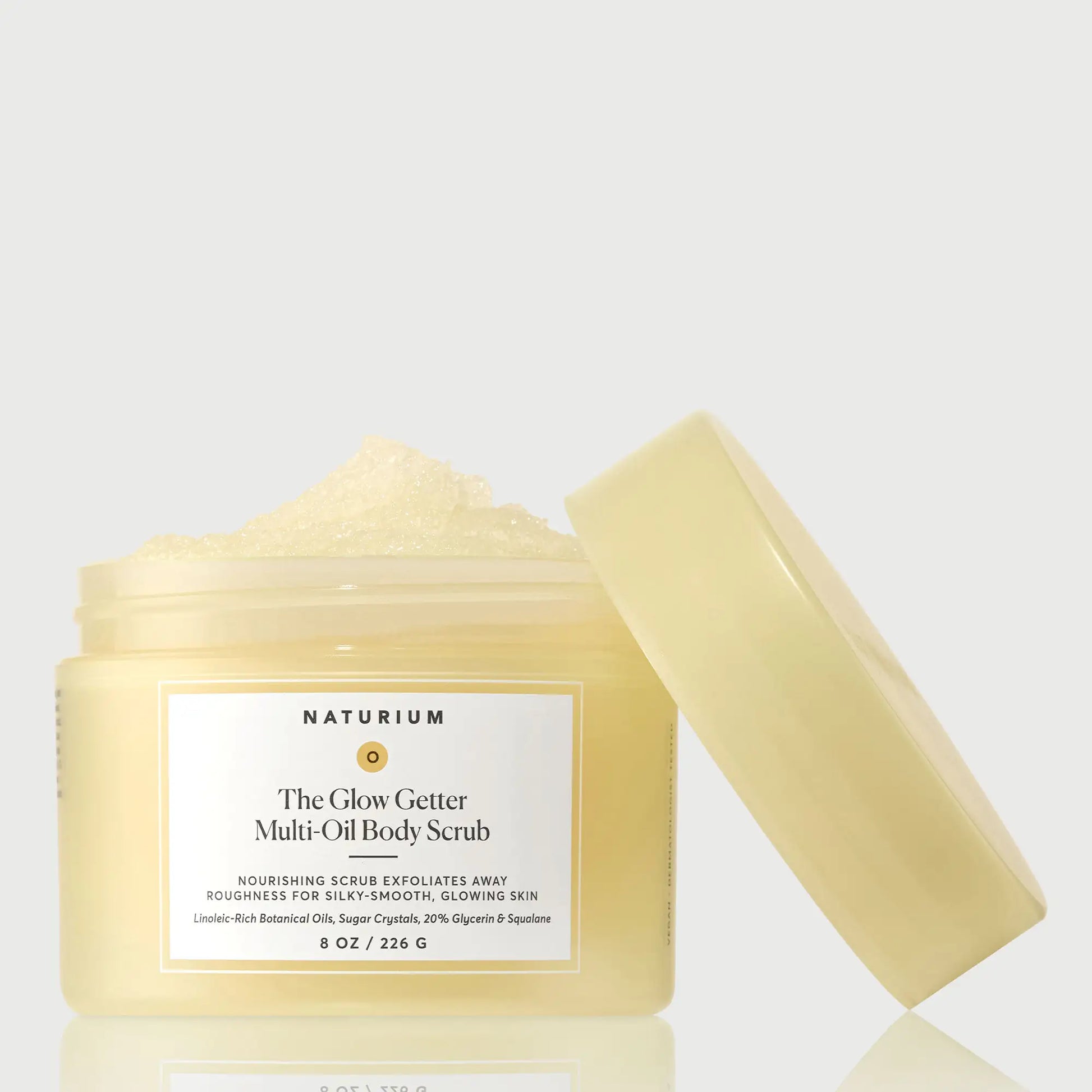 the-glow-getter-multi-oil-body-scrub-i5 NATR-40028-GlowGetter-Multi-Oil-Body-Scrub-Front-CapOff-bonebkgd.webp