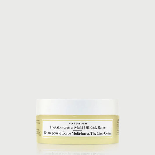 the-glow-getter-multi-oil-body-butter-travel-size-y0 NATR-40115_Glow-Getter-Body-Butter-Mini_front_capon_bonebkgd.webp
