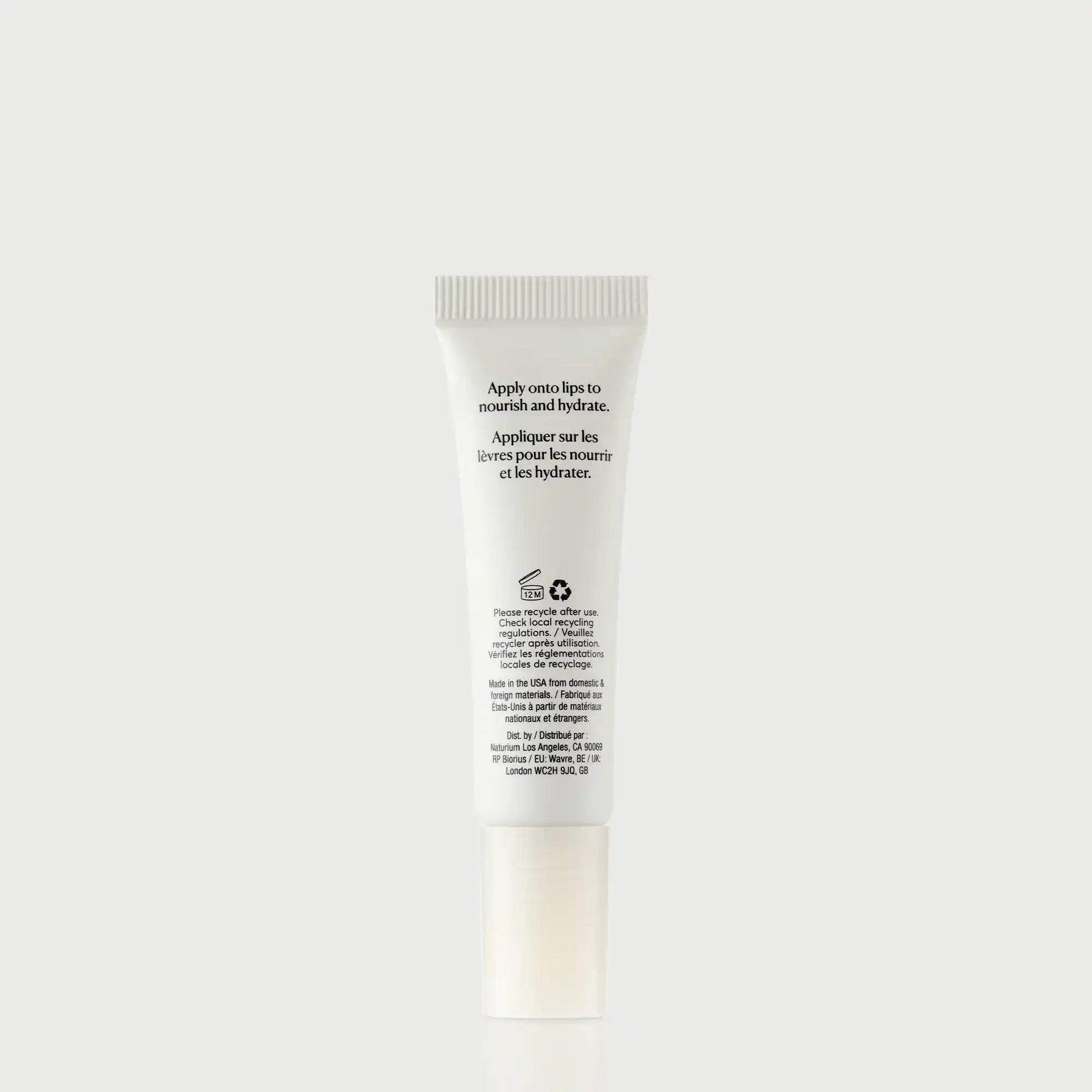 phyto-glow-lip-balm-clear-z8 NATR-60066_PhytoGlow_Clear_primary_capon_back-bonebkgd.webp