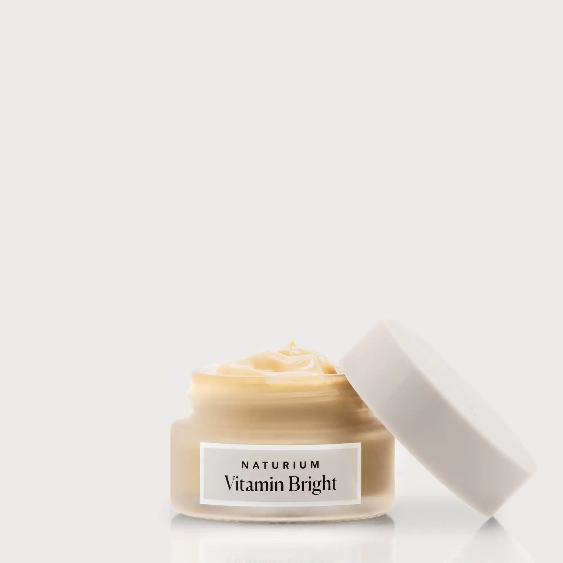 vitamin-bright-illuminating-eye-cream-c6 NATR-VitaminBright_LIGHT_Primary_front_openjar_bone.webp