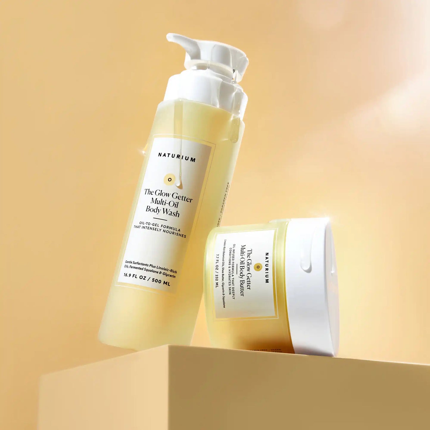the-glow-all-out-body-bundle-g9 gg-bodybutter_1464-crop_revcolor_FL.webp